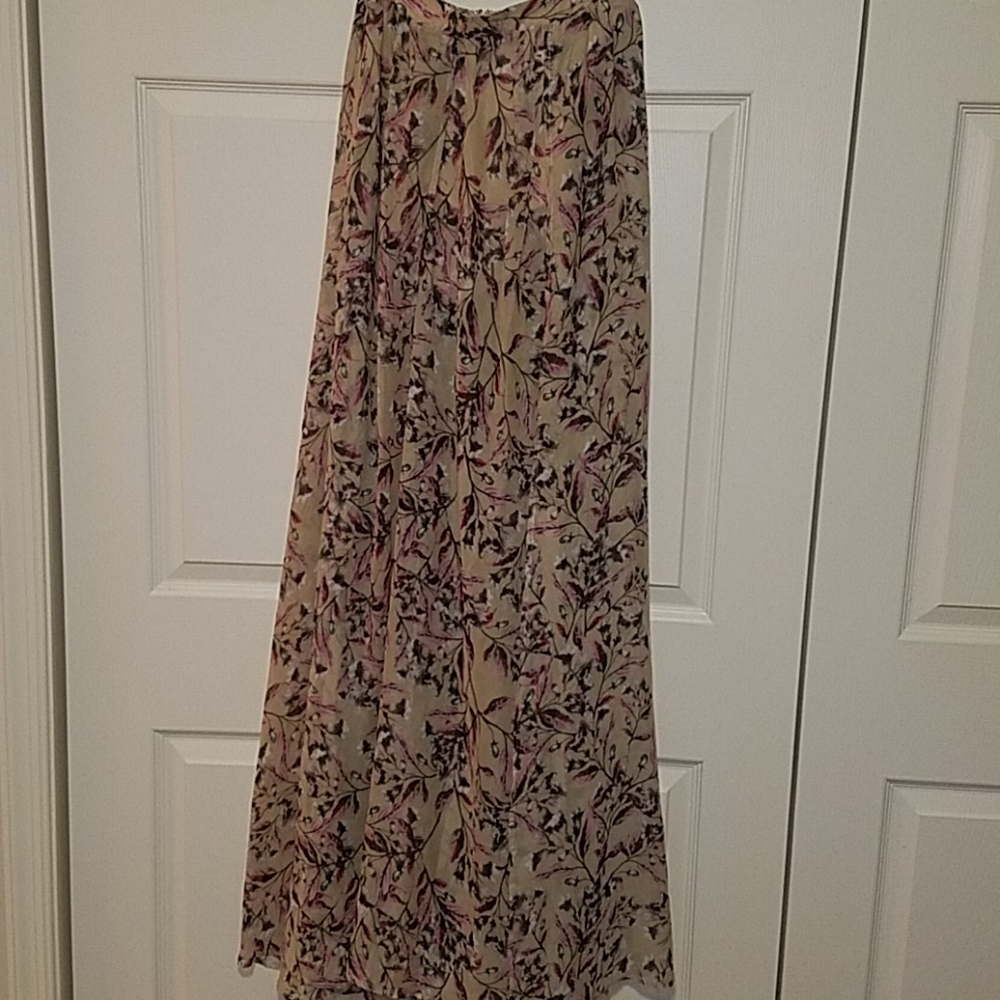 Maxi length floral skirt with two hip waisted slit